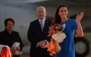 Catherine of Cambridge arrives in Canberra in blue Ridley dress by Stella McCartney.jpg